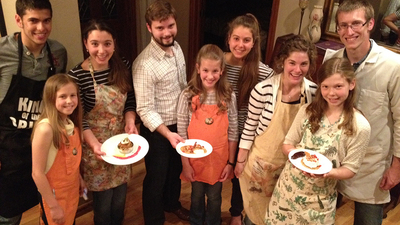 A group of Herbert W. Armstrong College students and their helpers present their 'Chopped!' challenge desserts. (Photo courtesy of Michelle Hilliker)