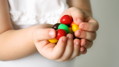 Child holding candies