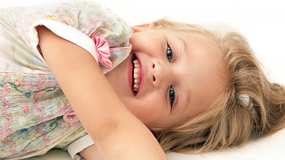 Little girl resting on the floor