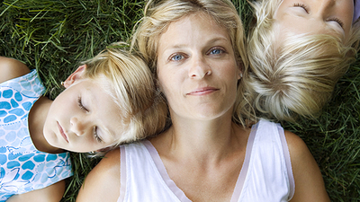 Mother with sleeping children
