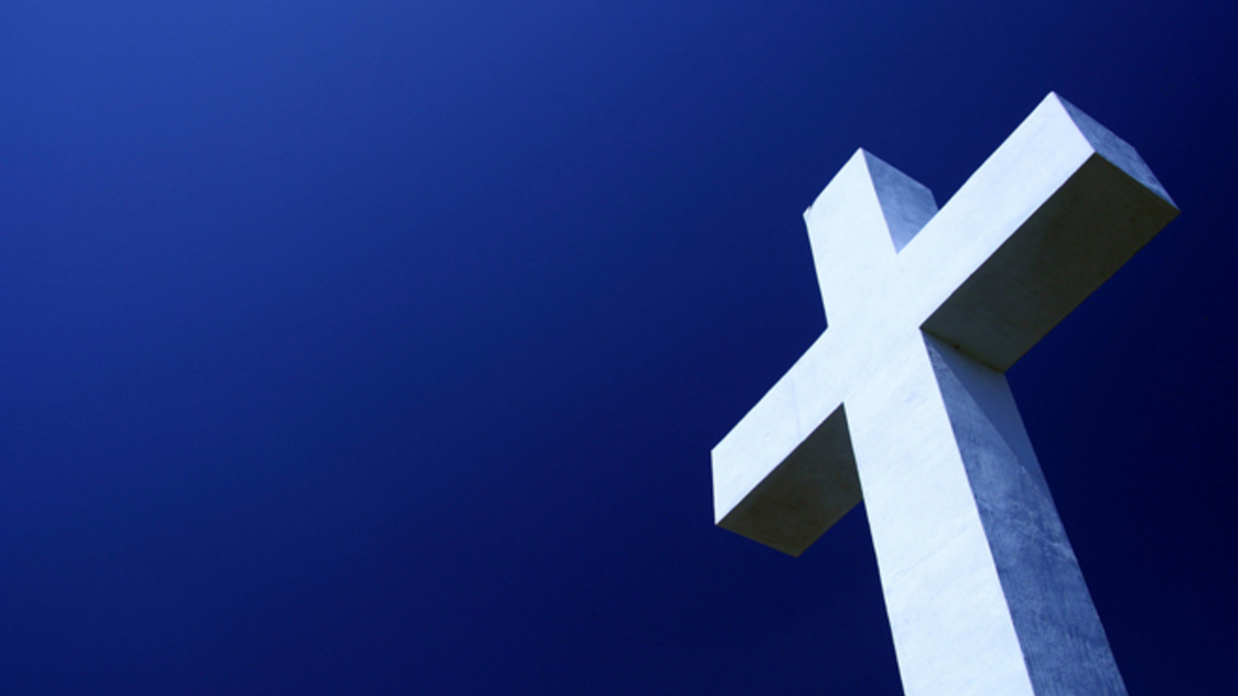 A picture of a cross, a symbol of Christianity that people wear.
