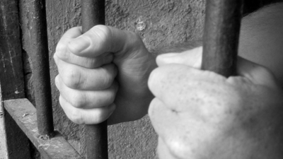 Captive behind bars