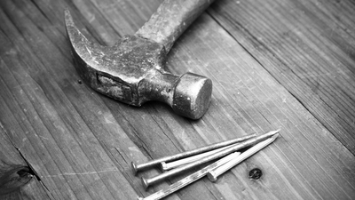 Hammer and nails black and white