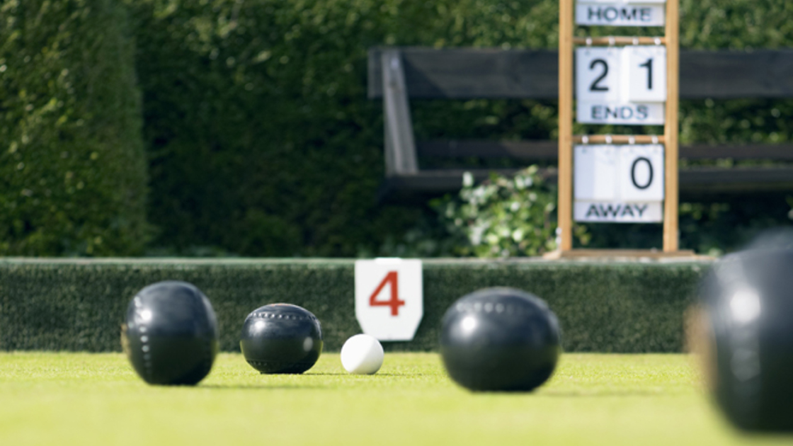Bowling Balls on a Bowling Green and a Scoreboard