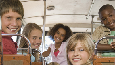 Children sitting on school bus