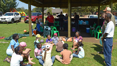 Children gather to say farewell to Nathan Mofokeng. (Photo: Ronald Henery)