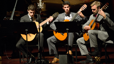 Johnathan Mansour, Kieren Underwood and Daniel Westerbaan play a guitar trio at Armstrong Auditorium.