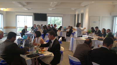 Members laugh, talk at Sydney Spokesman Club ladies' night.  