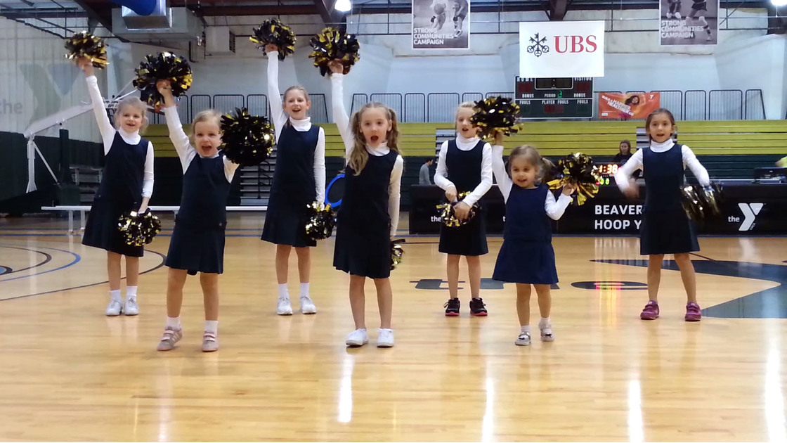 Pre-teen cheerleaders during the half-time performance. 