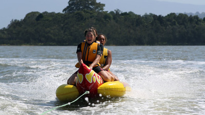 PYC counselor Erica Irwin and camper Leilani King on Lake Illawarra.