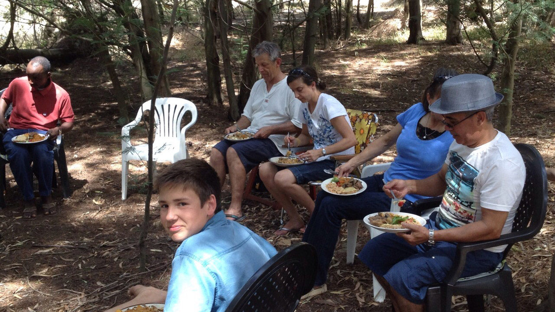South African members enjoy lamb and chicken curry 'potjie'.