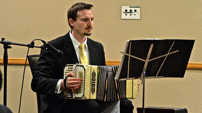 Benjamin Tryba plays the accordion. 