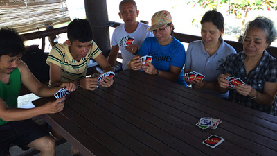 Iloilo members play Uno. 