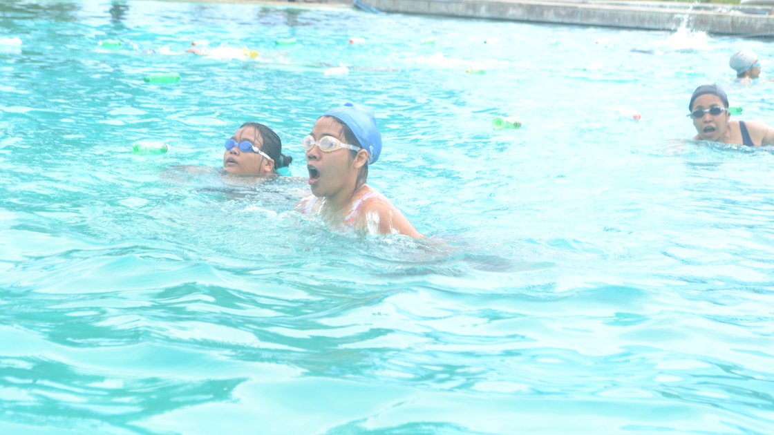 Heidi Rodis and Heide Villanueva races on their 4th lap and Sandra Santos catches behind.JPG