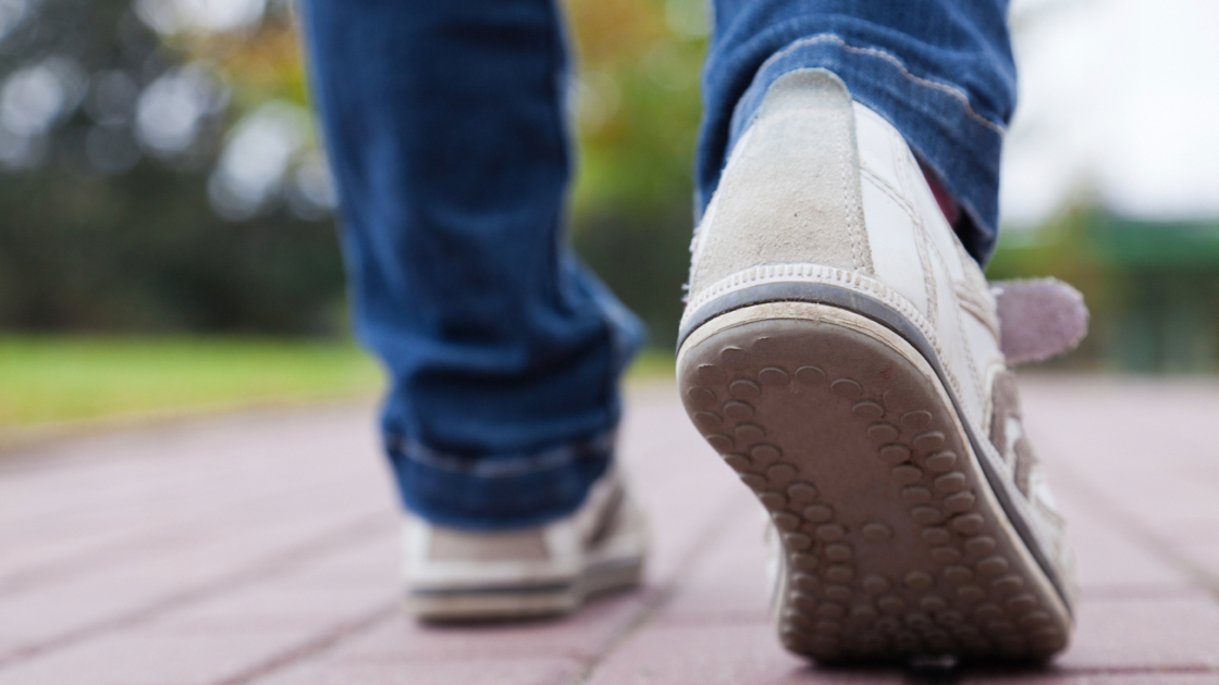 16x9(Become you perfect)
Teenager walking in sport shoes on pavement in autumn day