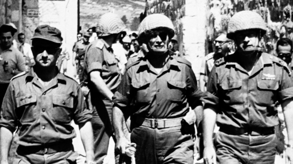16x9(Six day war)
Photo taken in June 1967 in Jerusalem shows the deputy chief-of-staff of the Israeli army, General Yitzhak Rabin (R) and  Israeli Defense Minister Moshe Dayan (C) during the Six-Day War, fought between June 5 and 10, 1967, by Israel and the neighboring states of Egypt (known at the time as the United Arab Republic), Jordan, and Syria.  AFP PHOTO        (Photo credit should read STRINGER/AFP/Getty Images)