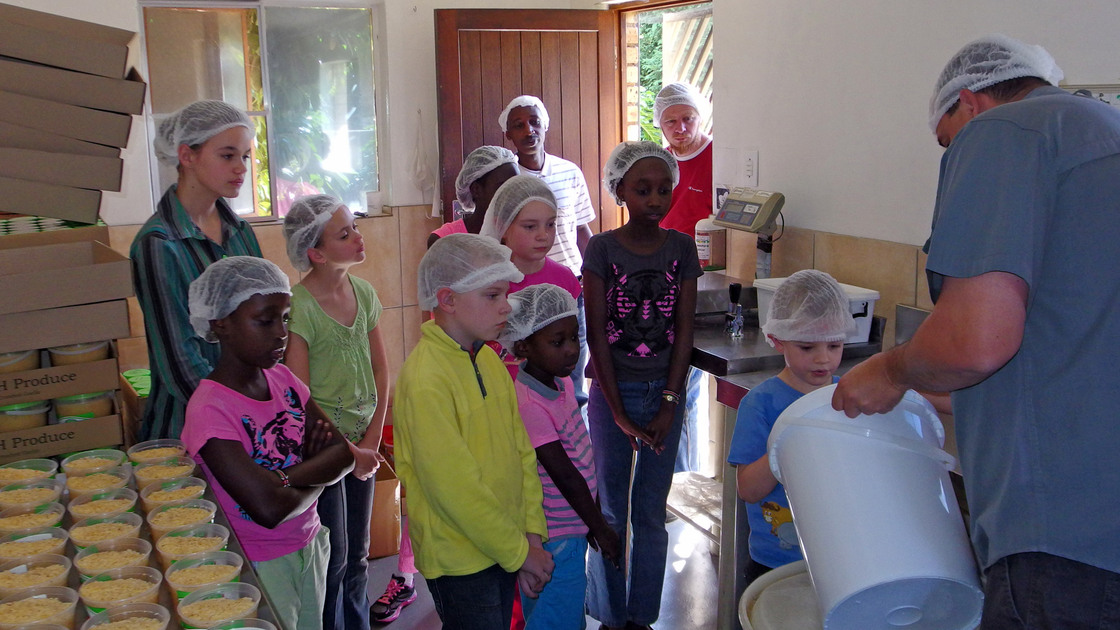 Philadelphia Church of God member Gregory Lightfoot gives a tour of the crushed garlic factory. 