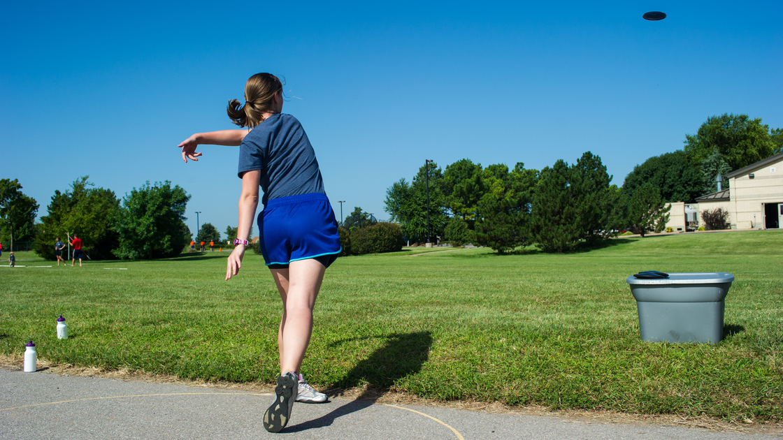 Eva Hochstetler throws a discus during track practice.