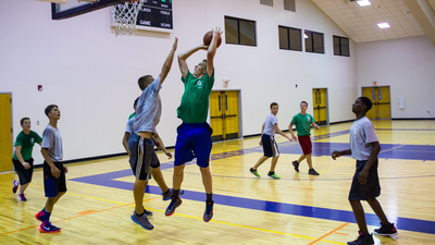 Caleb Heerma uses his height advantage to score 2 points for his team.