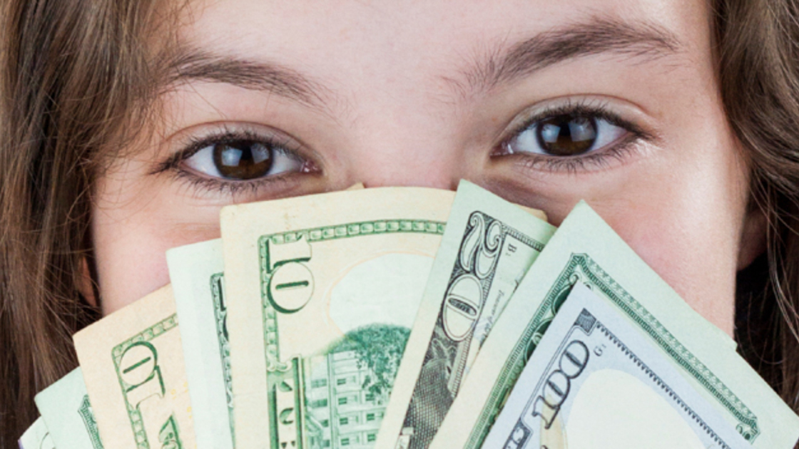 16x5(God's Tithing Challenge)
Beautiful teen girl holding money cavering her face