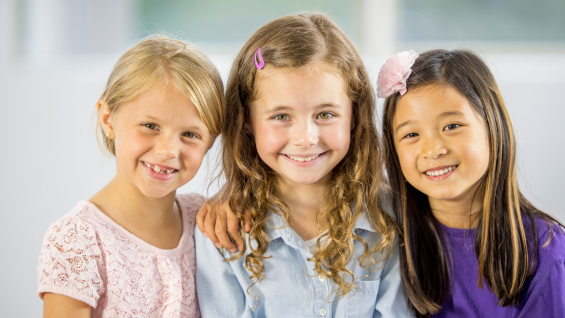 16x9(Best Friends Forever)
A multi-ethnic group of elementary age students are sitting together and smiling while looking at the camera.