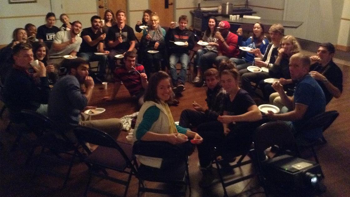 (16x9) Seniors and Freshman of Herbert W. Armstrong College enjoy their time together inside on a cool and rainy night in Oklahoma.