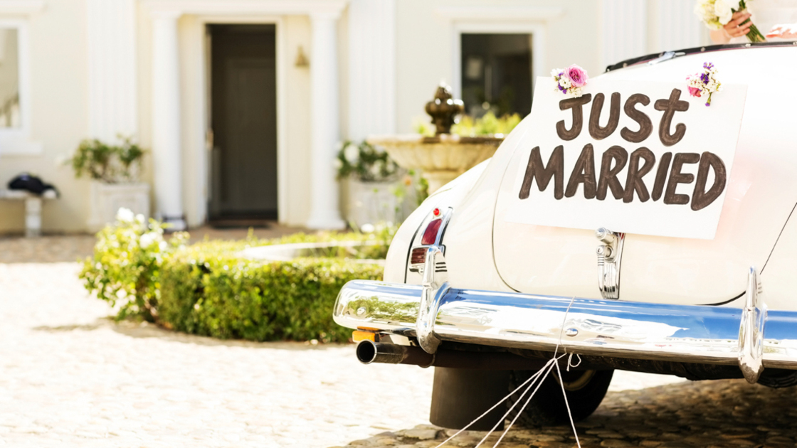 16x9(Be not afraid)
Just married sign and cans attached to convertible car. Horizontal shot.