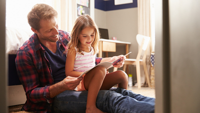 16x9(Parents and children potential)
Father and young daughter reading together