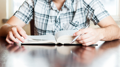 16x9(Does your Bible Study benefit you?)
Christian teenager in his daily devotional. Young man reading the Holy Bible