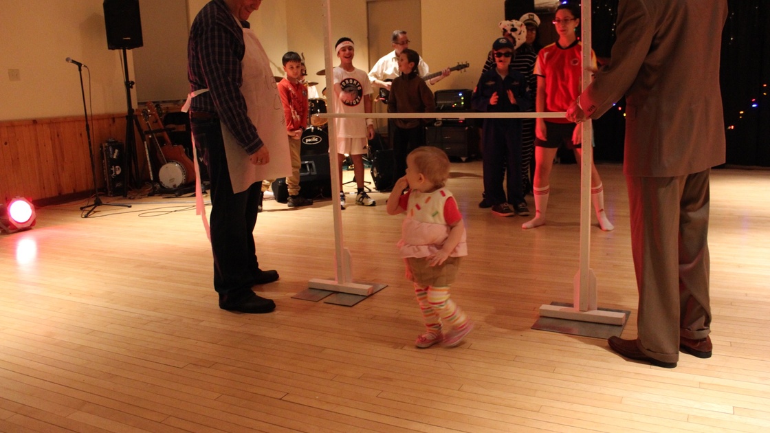Toddler Galilee Fuller says, “What’s so hard about the limbo?”
