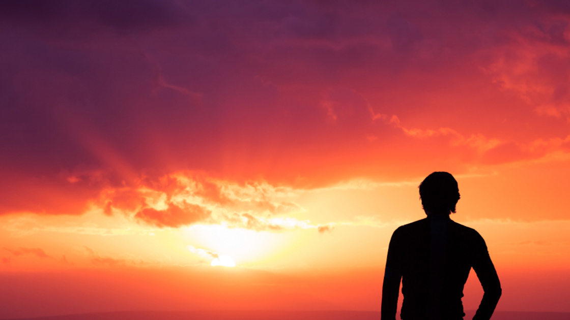 16x9(Signs of the times)
Silhouette of a Young Man Standing with a Bicycle at Sunset by the Sea. Beautiful Nature Background. Sport and Healthy Lifestyle Concept. Toned Photo with Copy Space.