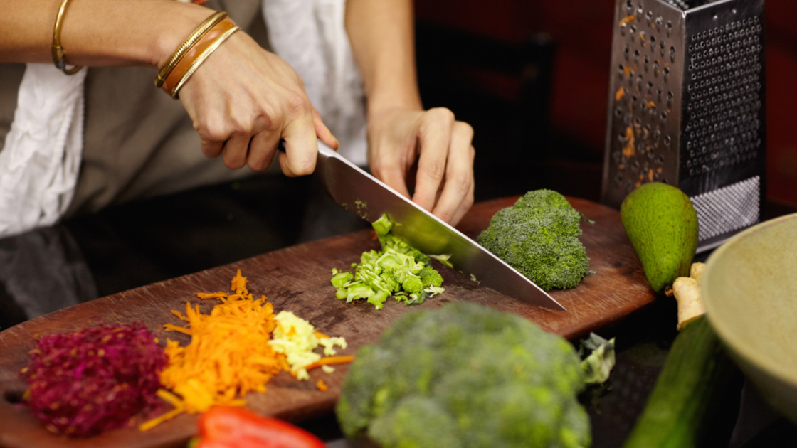 16x9(Take your Thyme)
Cropped image of a woman preparing dinner at home