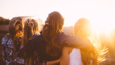 16x9(Enriching friendships)
Rearview of teen girl friends looking at the sunset together on a golden summer evening