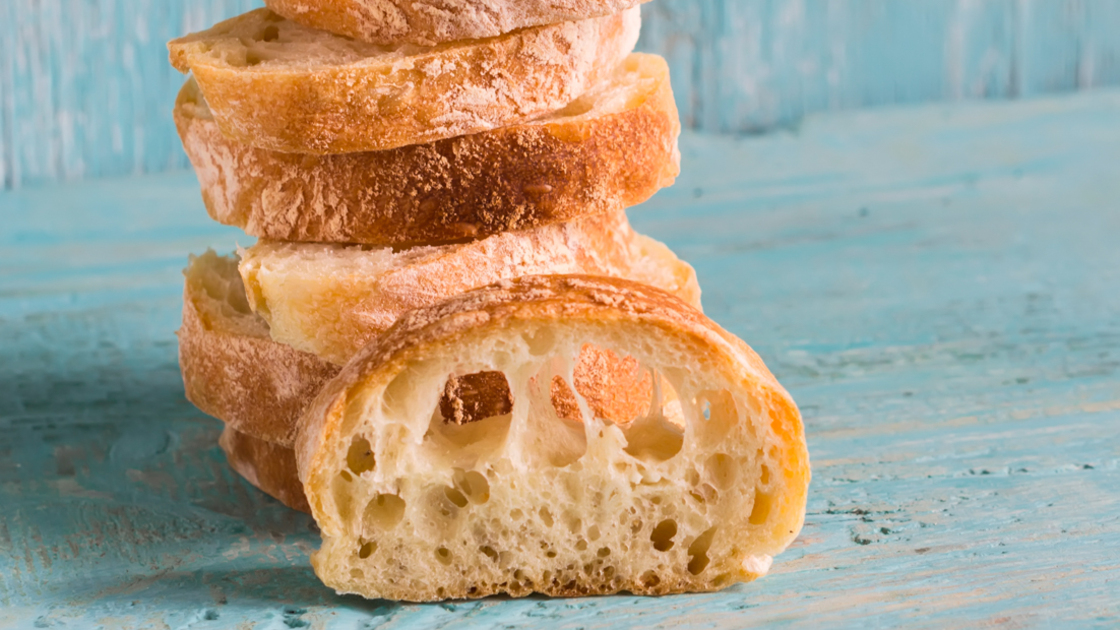 16x9(A Tiny Particle with a mighty purpose)
homemade rustic bread on a light wooden background