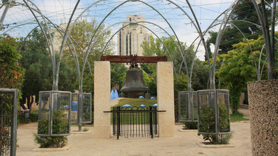 A copy of The Liberty Bell in a park