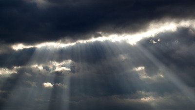 White Sunlight Through Black Clouds 