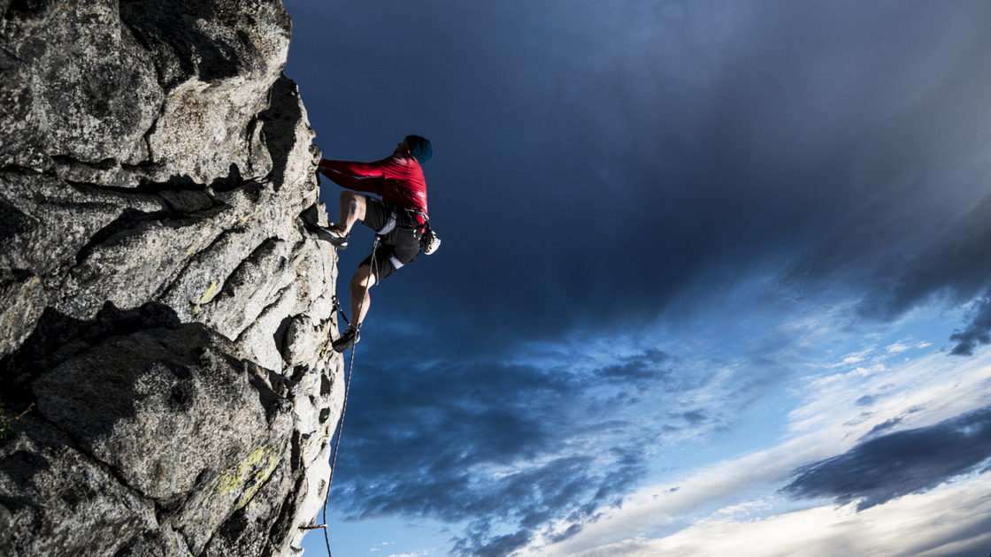 Rock climbing in a dramatic setting 