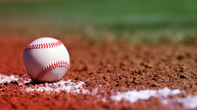 Baseball on the Chalk Line of the Infield