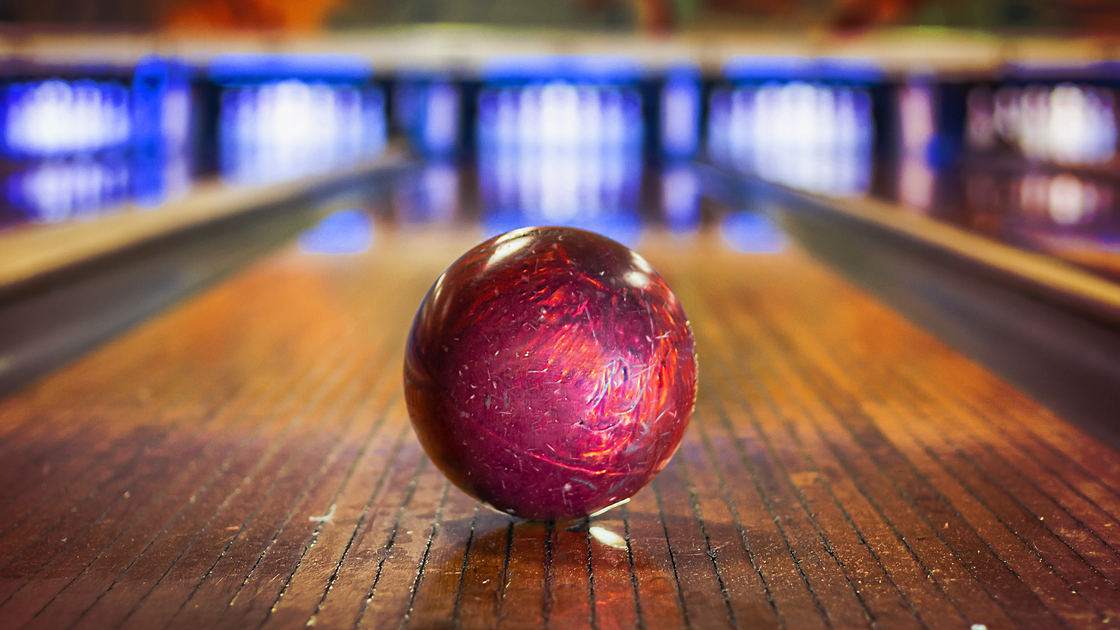 Bowling ball on bowling alley - Focus on ball
