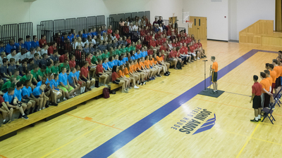 Campers and staff at stick night