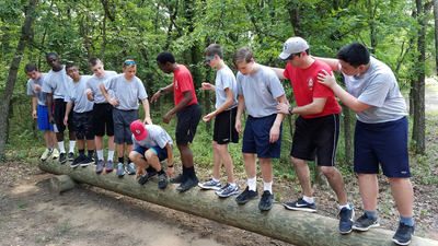 5B works to complete a team building exercise.