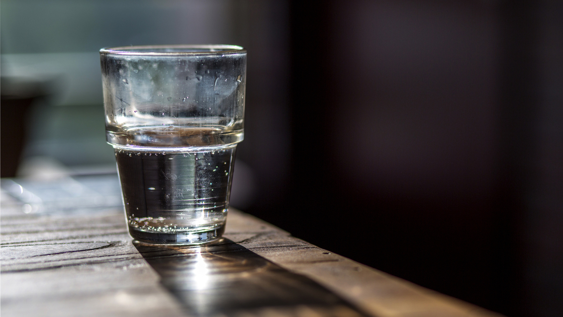 water glass on wooden table