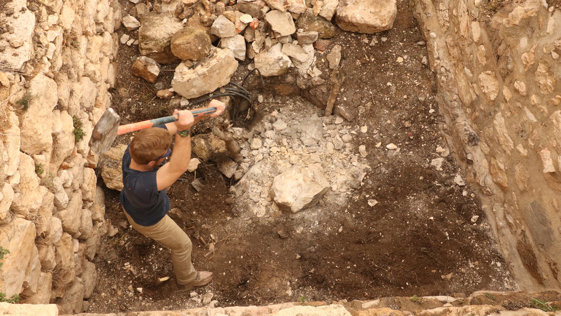 Mr. Armsrong, Dr. Mazar and Dr. Farrow overlook the exposed remains of centuries of history.