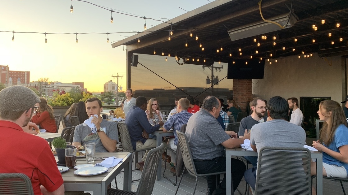 FOT 2018 FOT Singles activity, eating outside under lights, downtown OKC