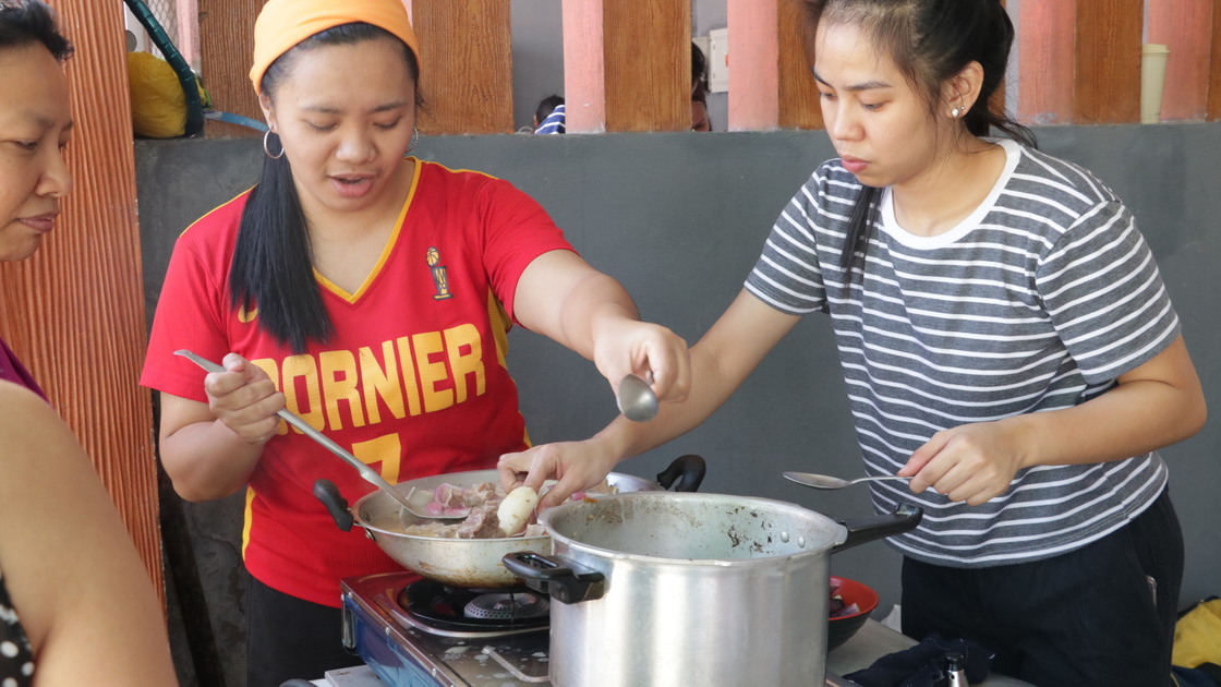 ACT Philippines cookfest, cooking over a pot 