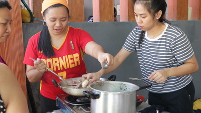 ACT Philippines cookfest, cooking over a pot 