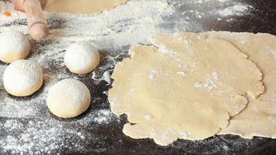 Unleavened dough for tortillas on kitchen table