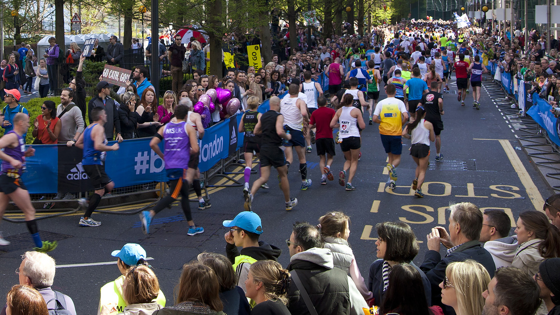 London, UK- April 13, 2014: London Marathon in Canary Wharf aria, massive sport event for professionals and amateurs sportsmen, Champions League