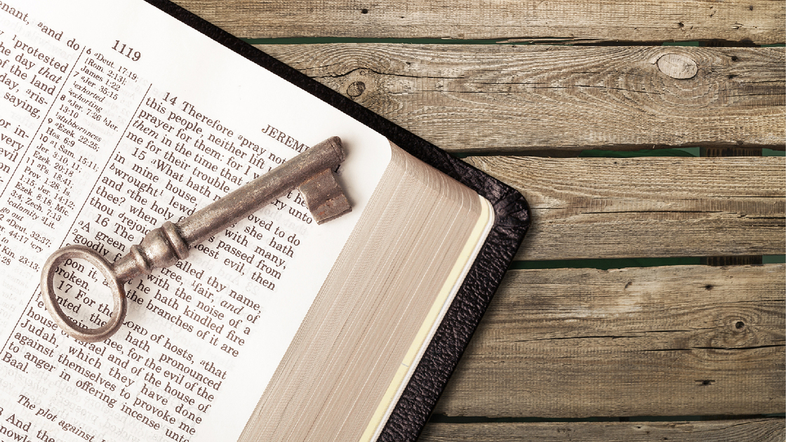 Holy bible book on wooden table