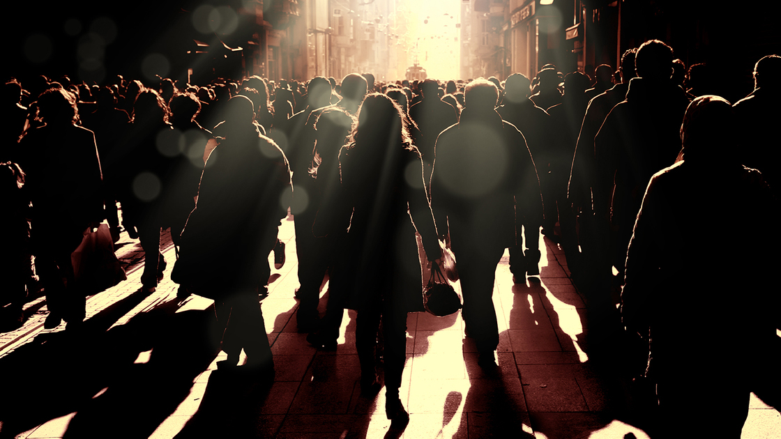 Close up image of crowded people walking on busy street in Istanbul, Turkey